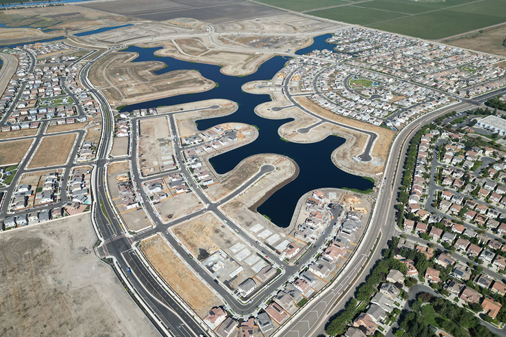 Aerial photo of a neighborhood under development.